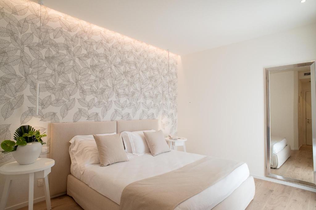 Postel nebo postele na pokoji v ubytování Hotel Elite