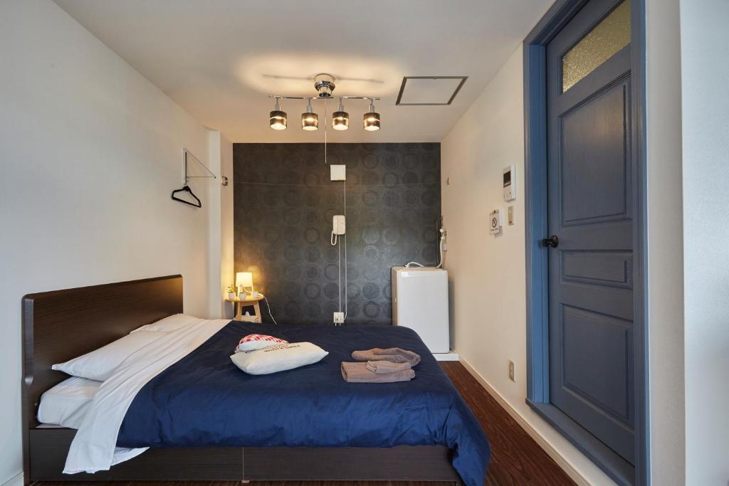 Postel nebo postele na pokoji v ubytování Hostel Cuore Kurashiki