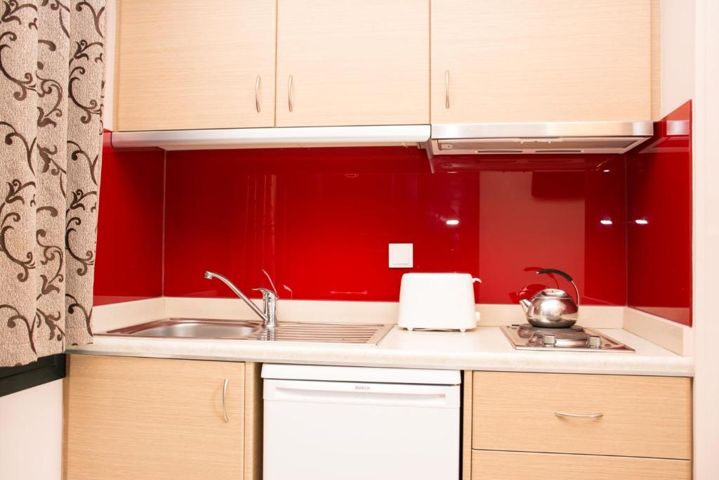 A kitchen or kitchenette at Marigianna Apartments