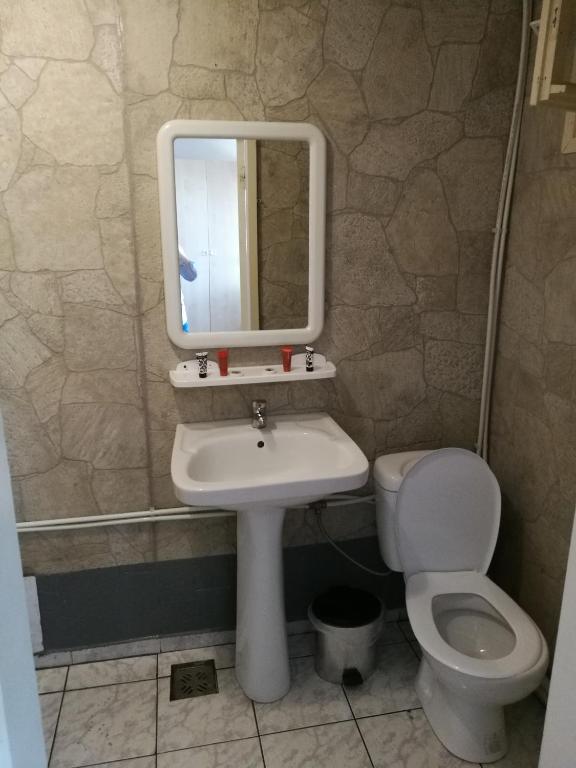 Koupelna v ubytování Hotel Dona