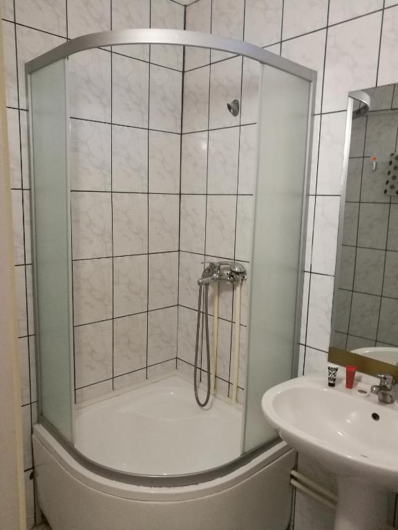 Koupelna v ubytování Hotel Dona