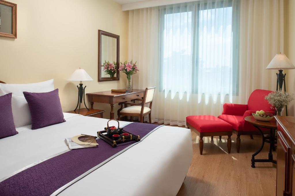Postel nebo postele na pokoji v ubytování Avani Hai Phong Harbour View Hotel