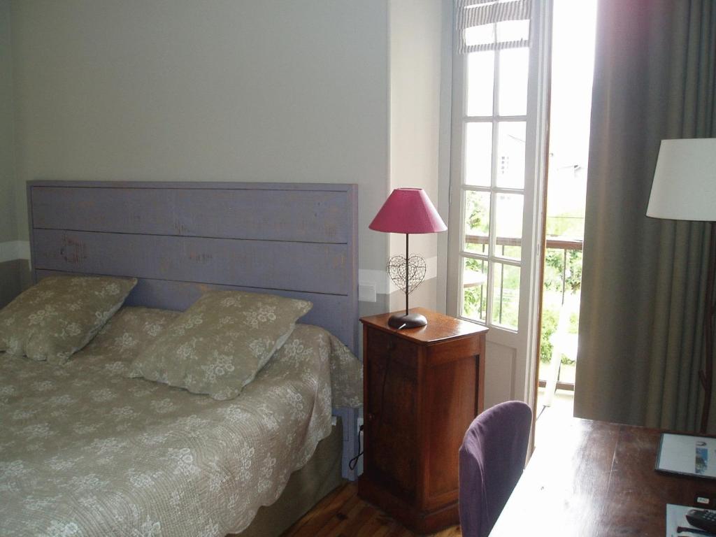 Postel nebo postele na pokoji v ubytování Villa Bon Repos