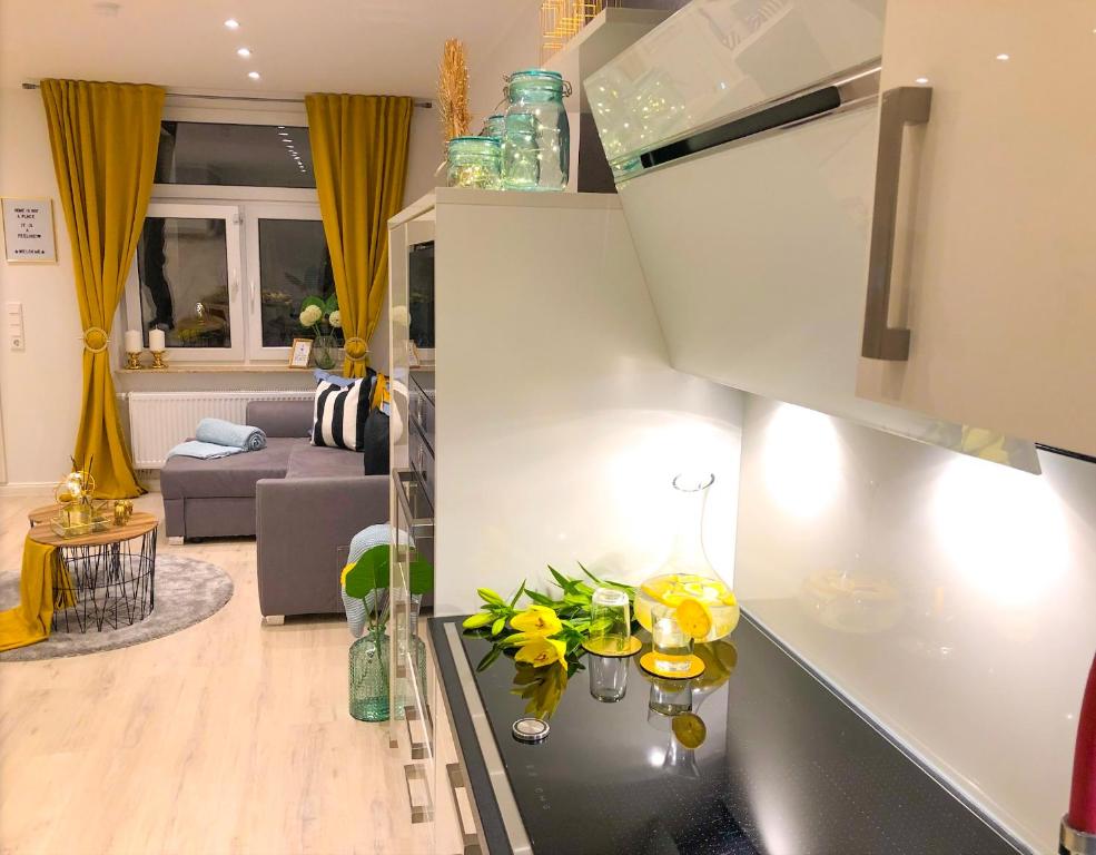 Kuchyň nebo kuchyňský kout v ubytování Ferienwohnung Domizil am Delft Emden