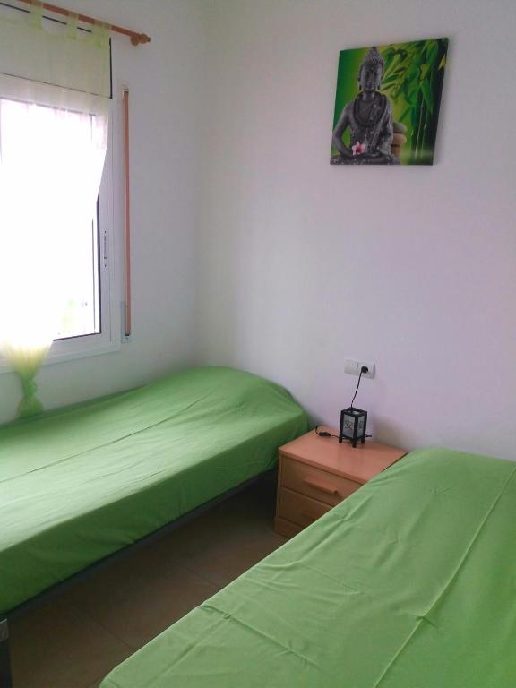 Posteľ alebo postele v izbe v ubytovaní Maison pour couples ou famille avec enfants