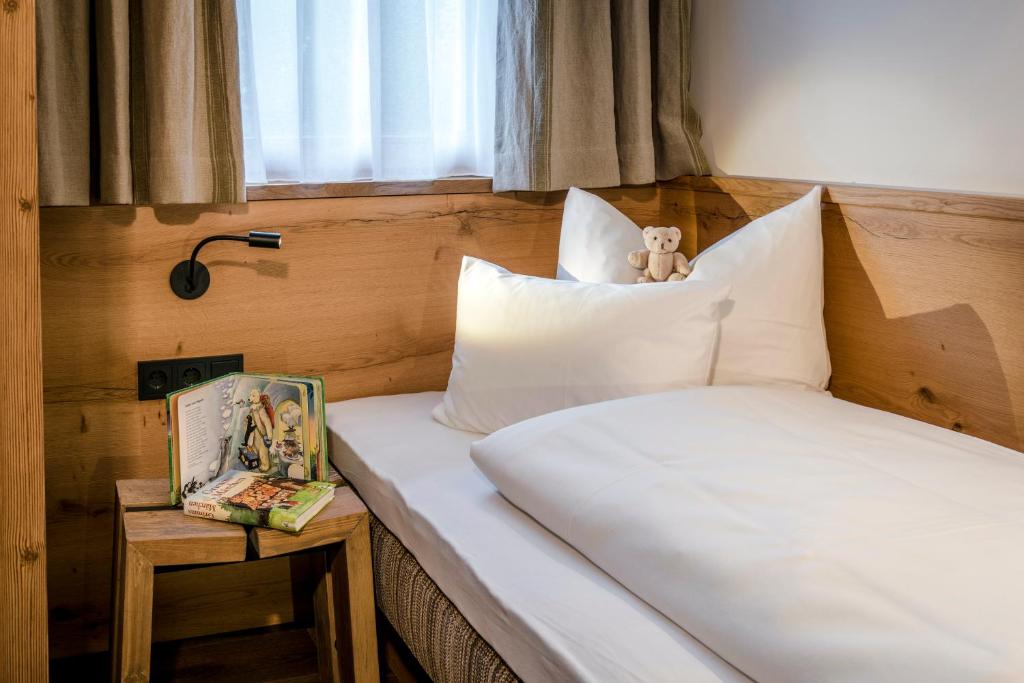Postel nebo postele na pokoji v ubytování Kaiserlodge
