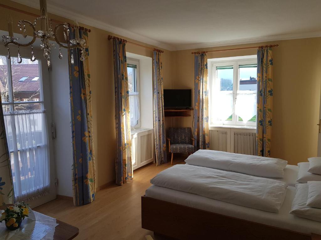 Postel nebo postele na pokoji v ubytování Hotel - Garni Stabauer