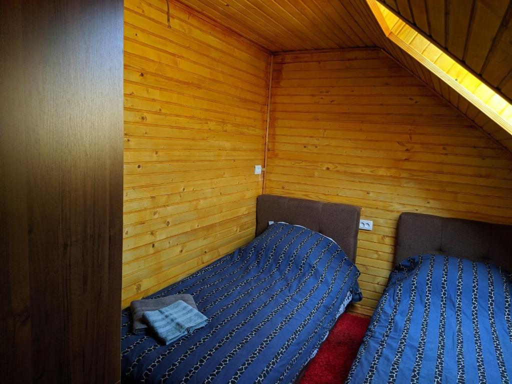 Postel nebo postele na pokoji v ubytování У Оксани
