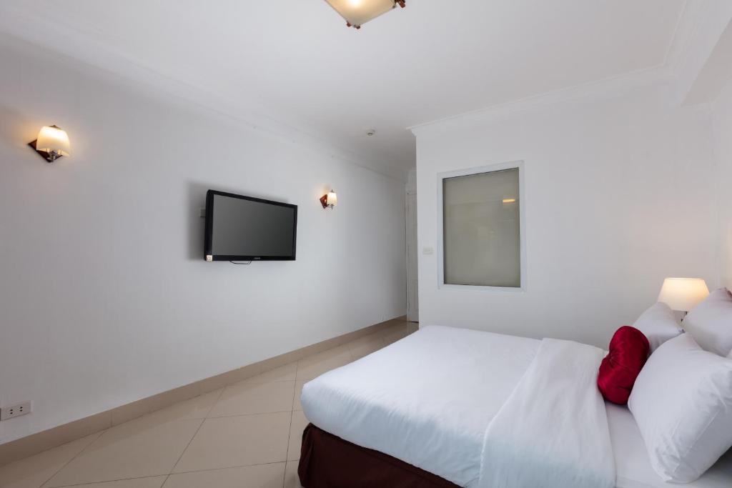 Postel nebo postele na pokoji v ubytování Hanoi Amore Hotel & Travel