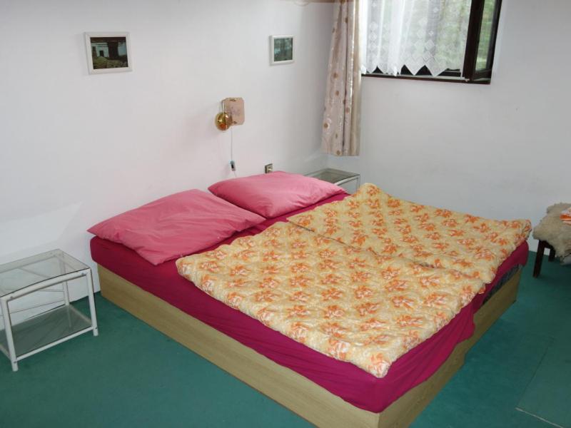 Postel nebo postele na pokoji v ubytování Apartma Šťastný II