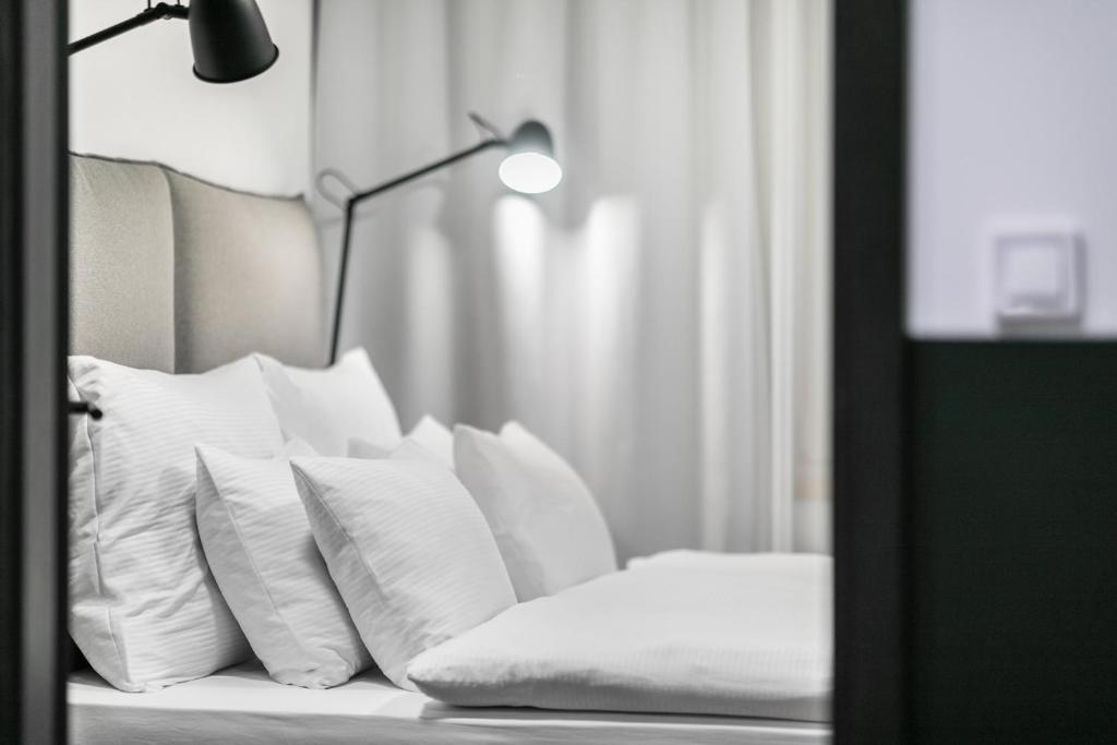 Posteľ alebo postele v izbe v ubytovaní Pytloun Flat Hotel