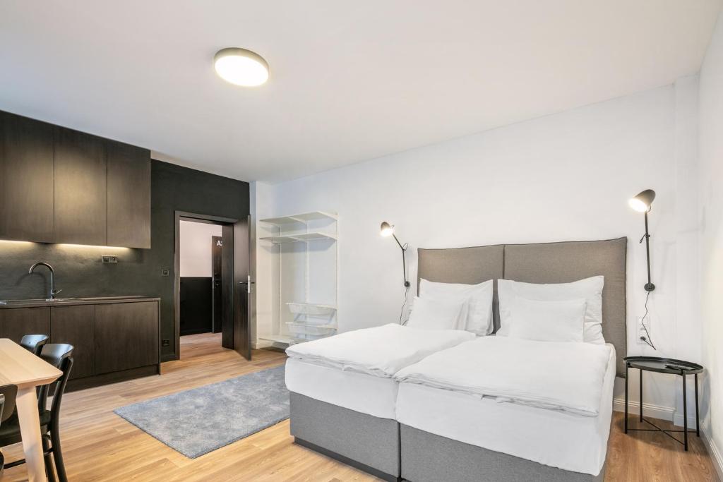 Posteľ alebo postele v izbe v ubytovaní Pytloun Flat Hotel