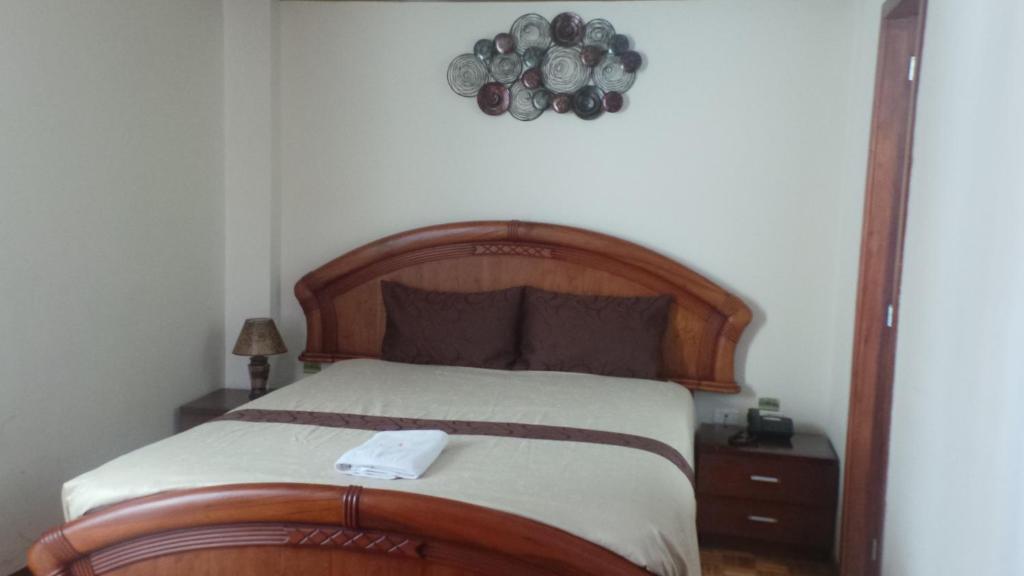 Postel nebo postele na pokoji v ubytování Hotel Villa Lafayette