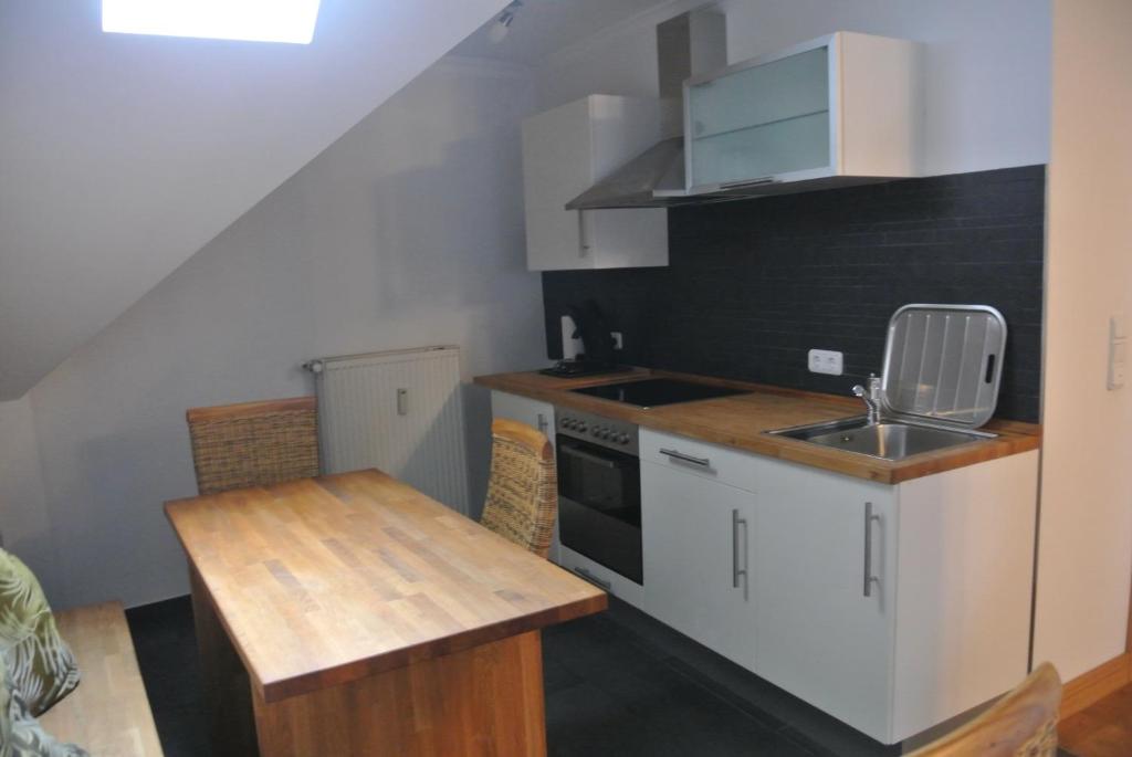 Kuchyň nebo kuchyňský kout v ubytování Gästehaus Sektstuuf St. Laurentius