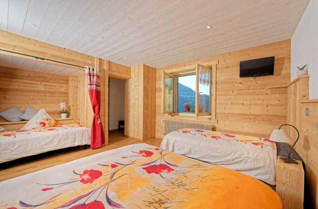 Postel nebo postele na pokoji v ubytování Au Bivouac de Napoléon et Spa