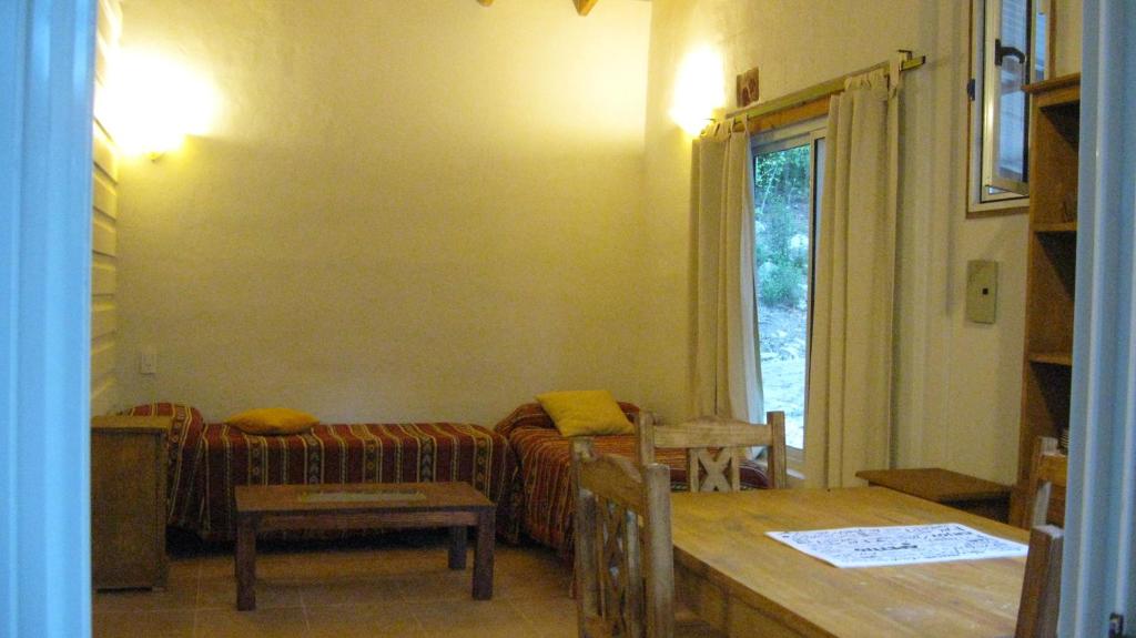 Posezení v ubytování Manantial Hostería & Cabañas