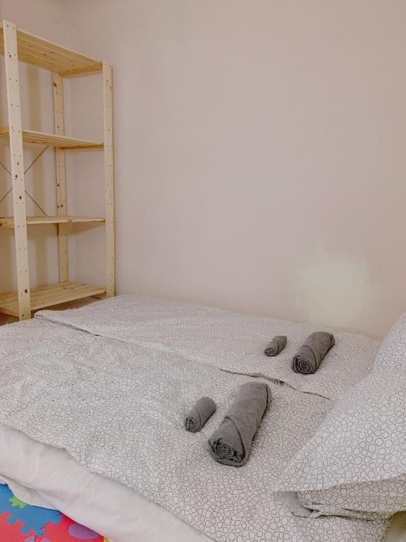 Postel nebo postele na pokoji v ubytování Budapest Three Cats Hostel