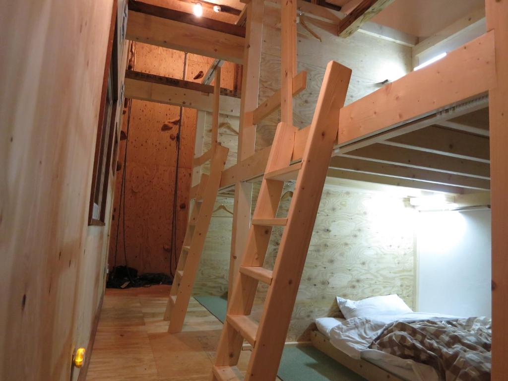 Postel nebo postele na pokoji v ubytování SappoLodge