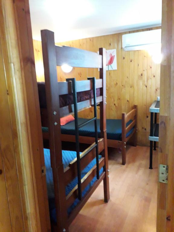 Postel nebo postele na pokoji v ubytování Apart-Hotel Colonia-Königsberg ESTACIONAMIENTO Deptos Completos Ubicado En El Centro De Valdivia AIRE ACONDICIONADO