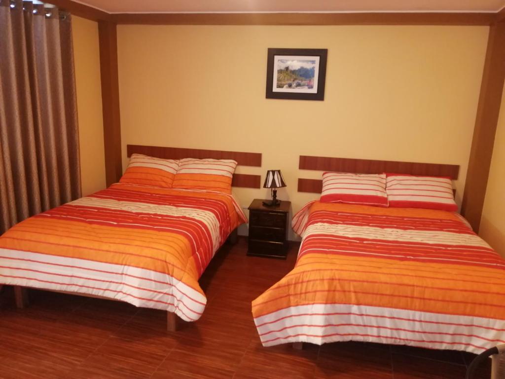 Postel nebo postele na pokoji v ubytování Nasca Travel One Hostel