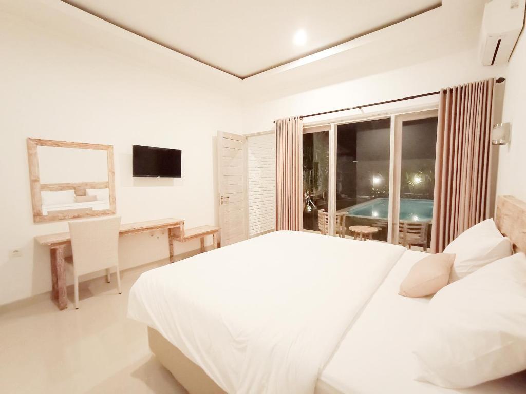 Berawa Dini Guesthouse - 7