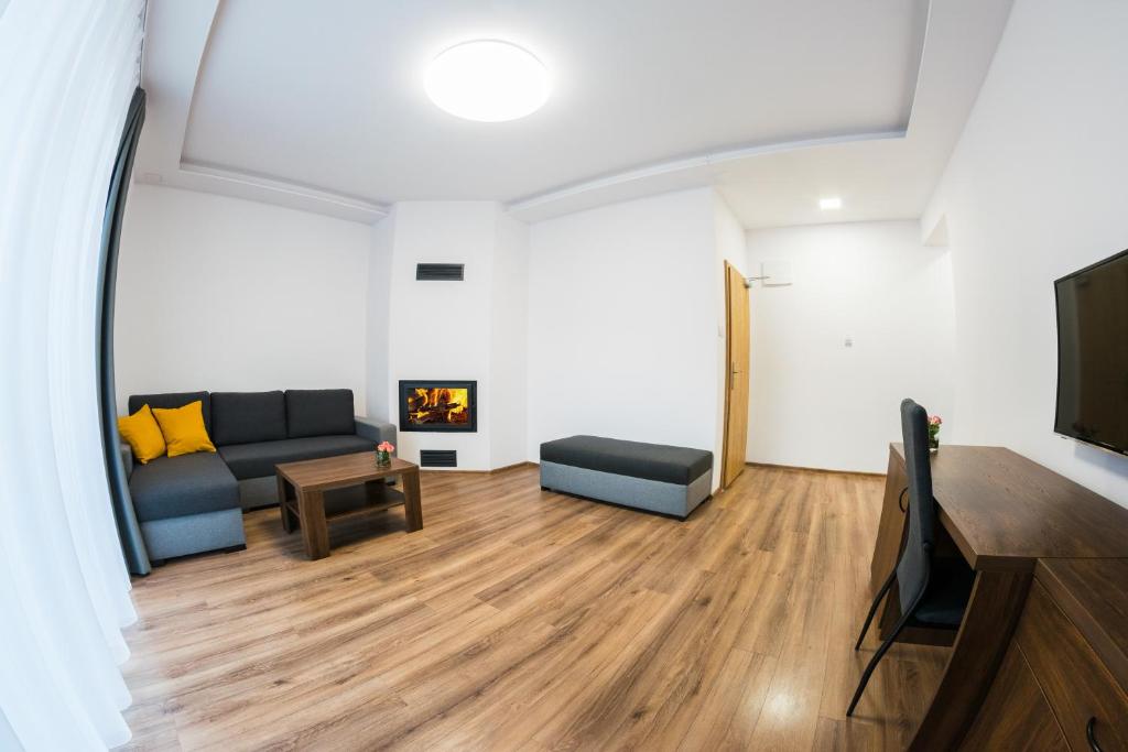 TV a/nebo společenská místnost v ubytování Chata Monumento