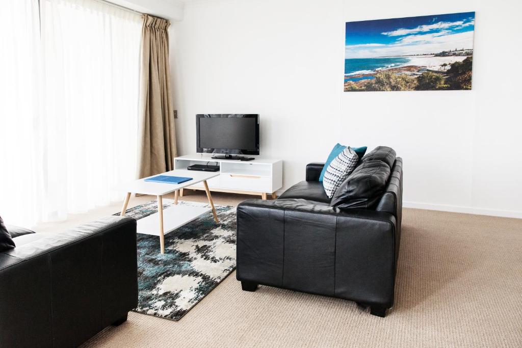 TV a/nebo společenská místnost v ubytování Ocean Views Resort Caloundra