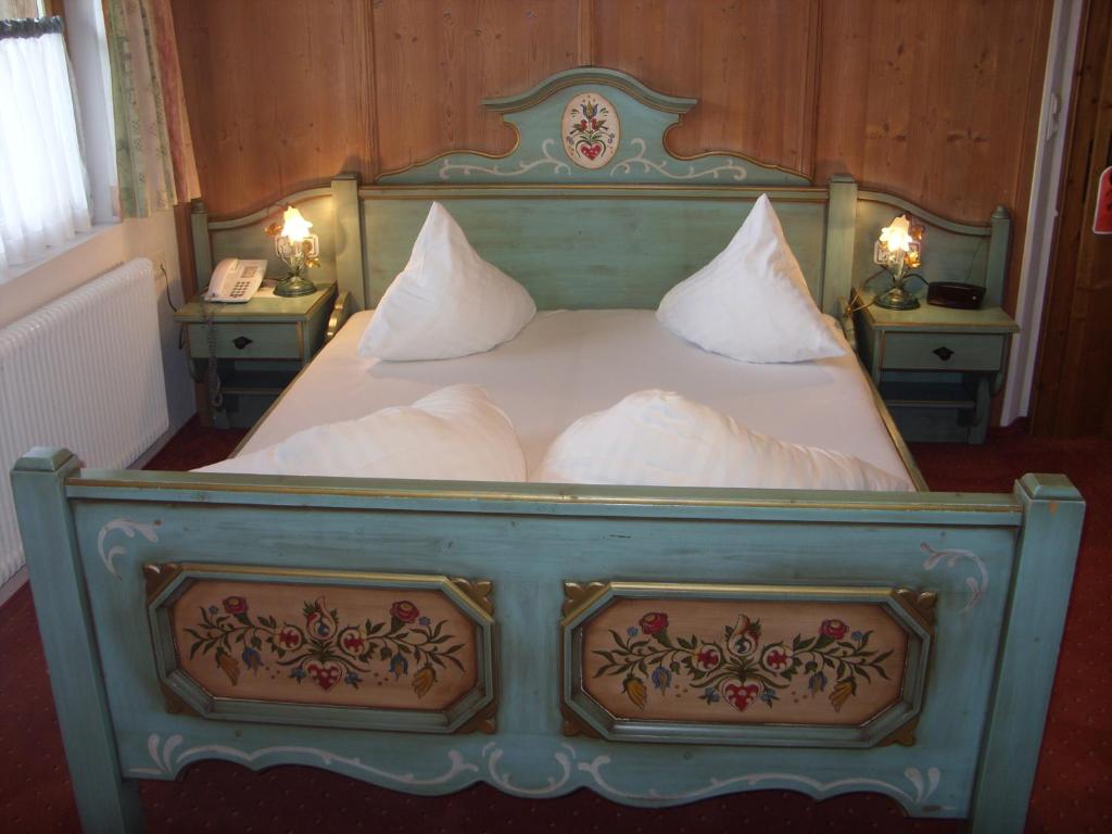 Letto o letti in una camera di Hotel Restaurant Hexenalm