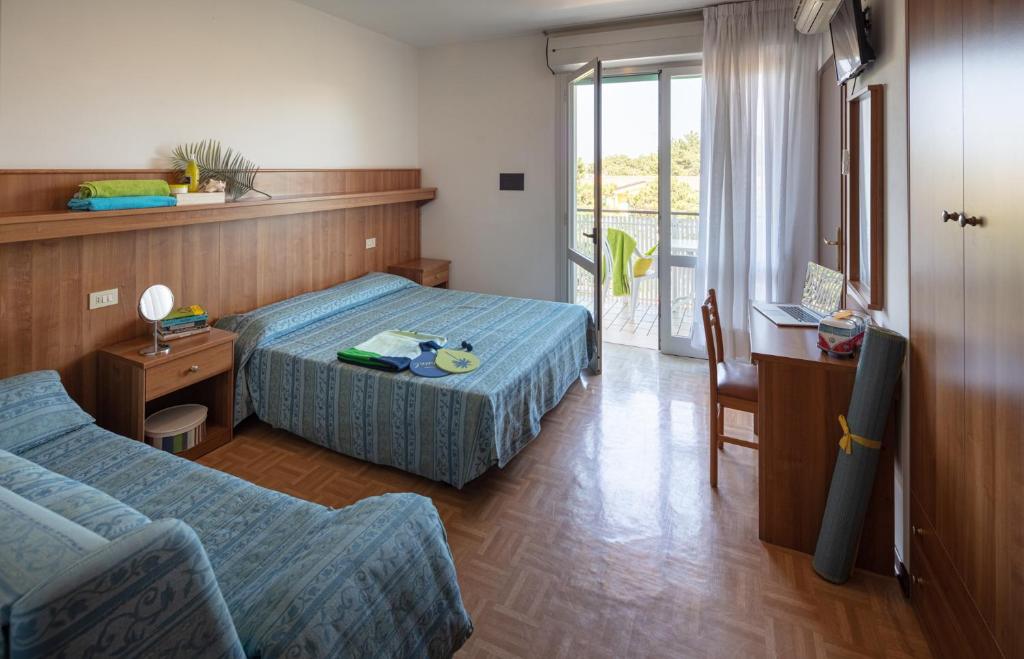 Postel nebo postele na pokoji v ubytování Hotel Aspe