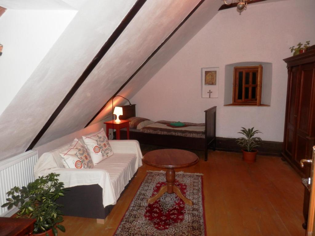 Postel nebo postele na pokoji v ubytování Apartmány U sv. Floriána