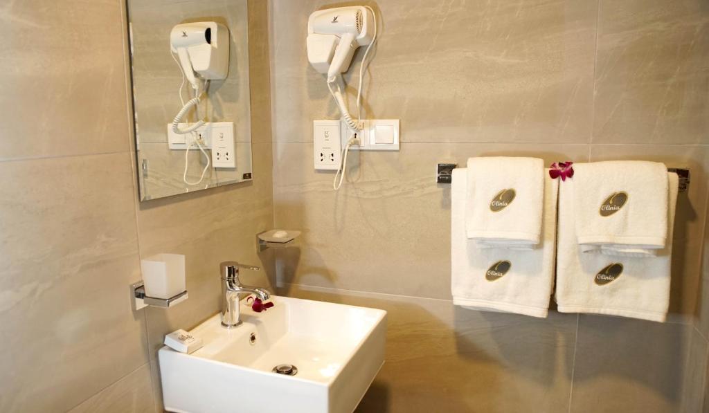 Koupelna v ubytování Olinia Airport Hotel