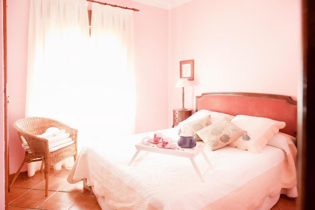 Postel nebo postele na pokoji v ubytování Apartamentos El Pajar del Abuelo
