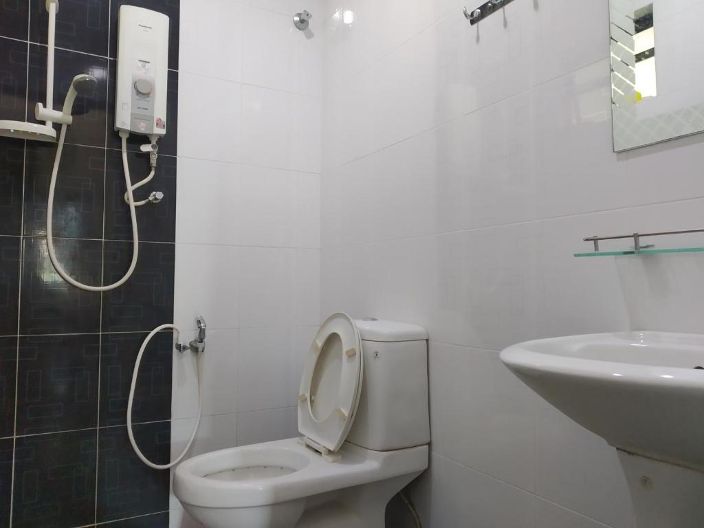 Koupelna v ubytování HMA Guesthouse