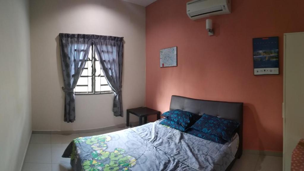 Postel nebo postele na pokoji v ubytování HMA Guesthouse