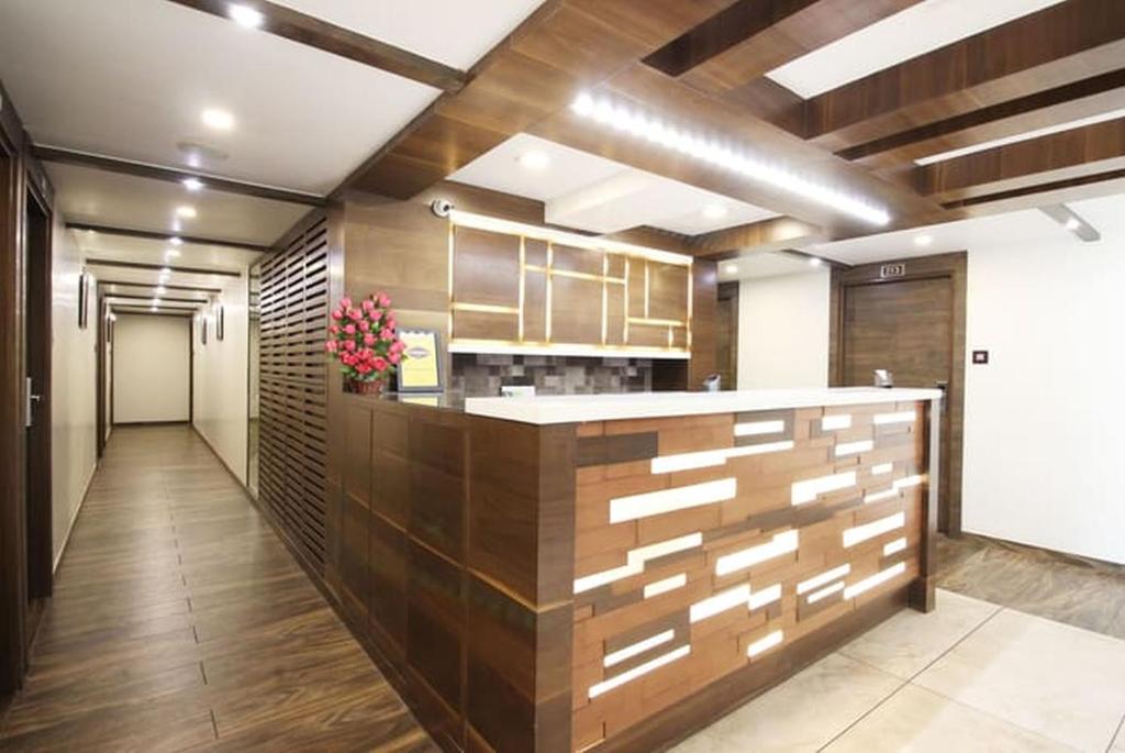 Kuchyň nebo kuchyňský kout v ubytování Hotel Aaram Orchard