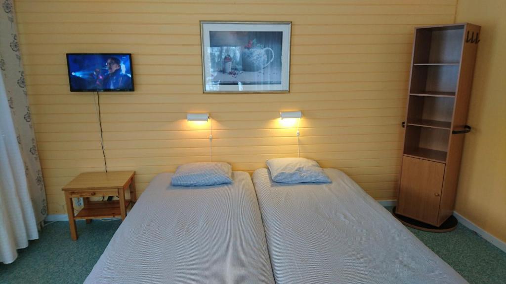 Postel nebo postele na pokoji v ubytování Bollegården B&B