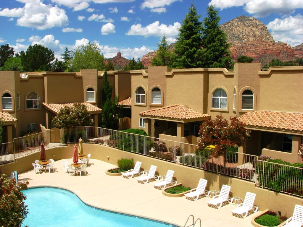 a view of the courtyard of a resort with a swimming pool at Sedona Springs Resort, a VRI resort in Sedona