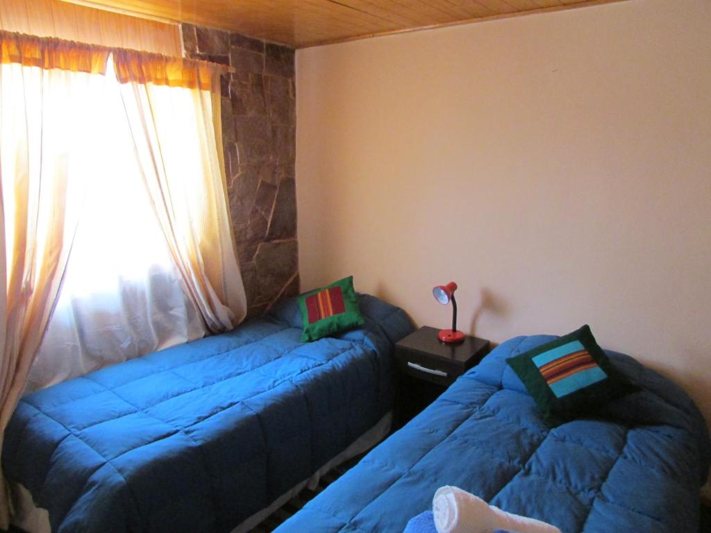 Postel nebo postele na pokoji v ubytování Hostal Desert