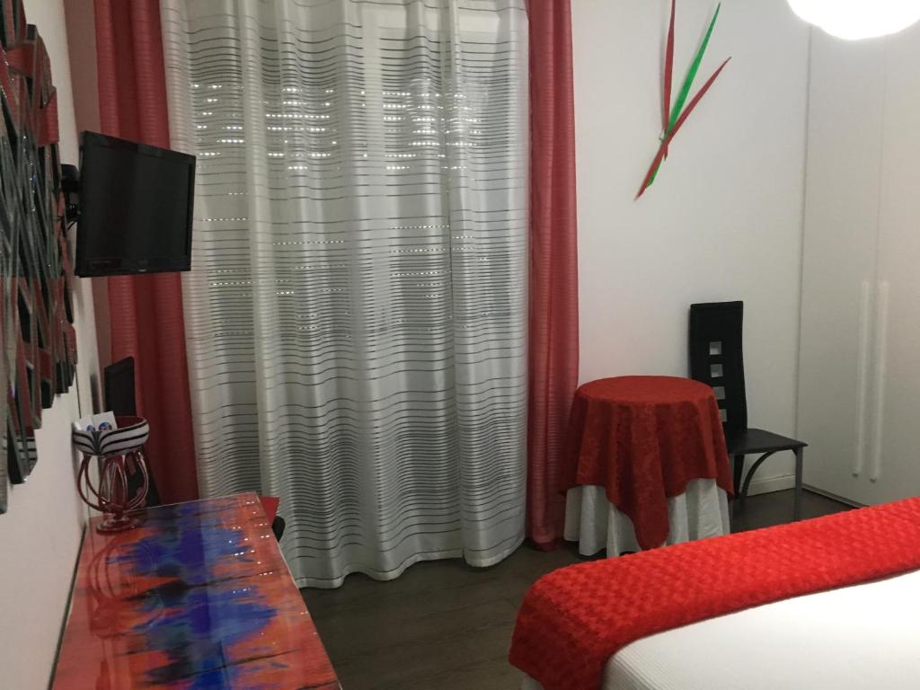 TV a/nebo společenská místnost v ubytování B&B Pitstop