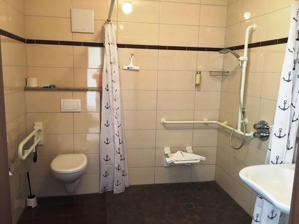 Koupelna v ubytování Usedom Bike Hotel & Suites