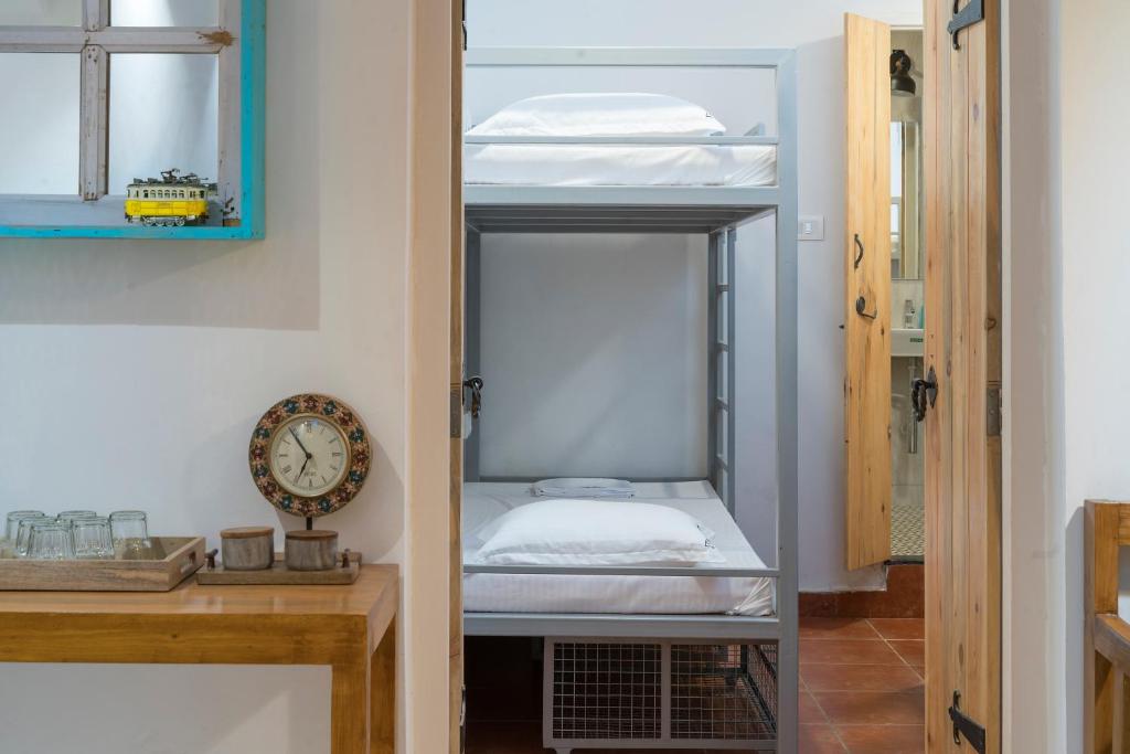 Una cama o camas en una habitación de The White Balcao