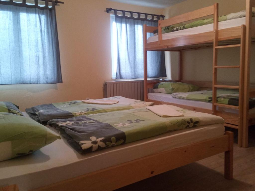 Postel nebo postele na pokoji v ubytování House Budkovič
