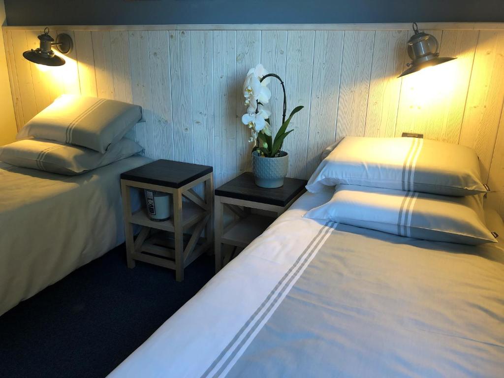 Cama ou camas em um quarto em La perle Atlantique, appartement 3-4 personnes dans une r&eacute;sidence de standing
