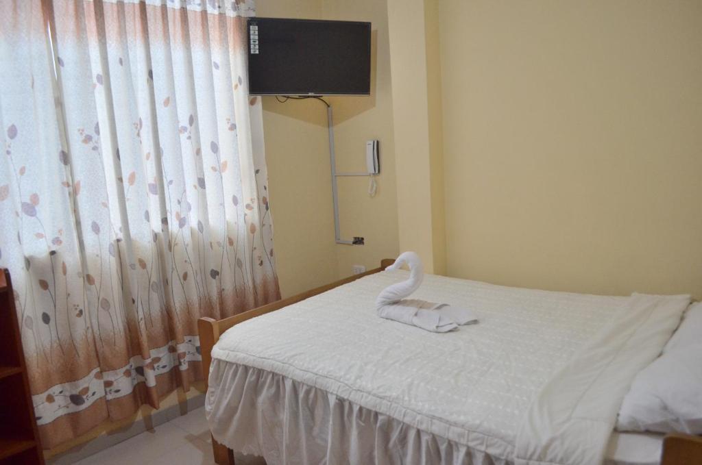 Postel nebo postele na pokoji v ubytování Rosenverg B&B Tours