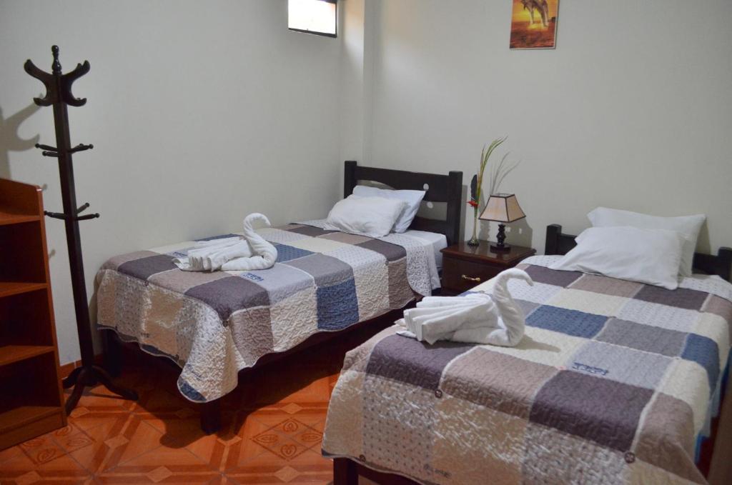 Postel nebo postele na pokoji v ubytování Rosenverg B&B Tours