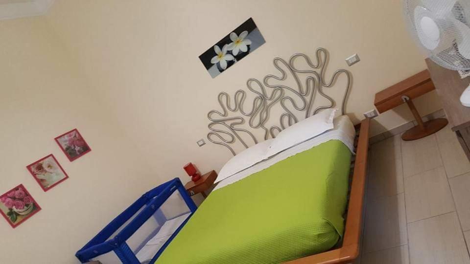 Postel nebo postele na pokoji v ubytování Angeli