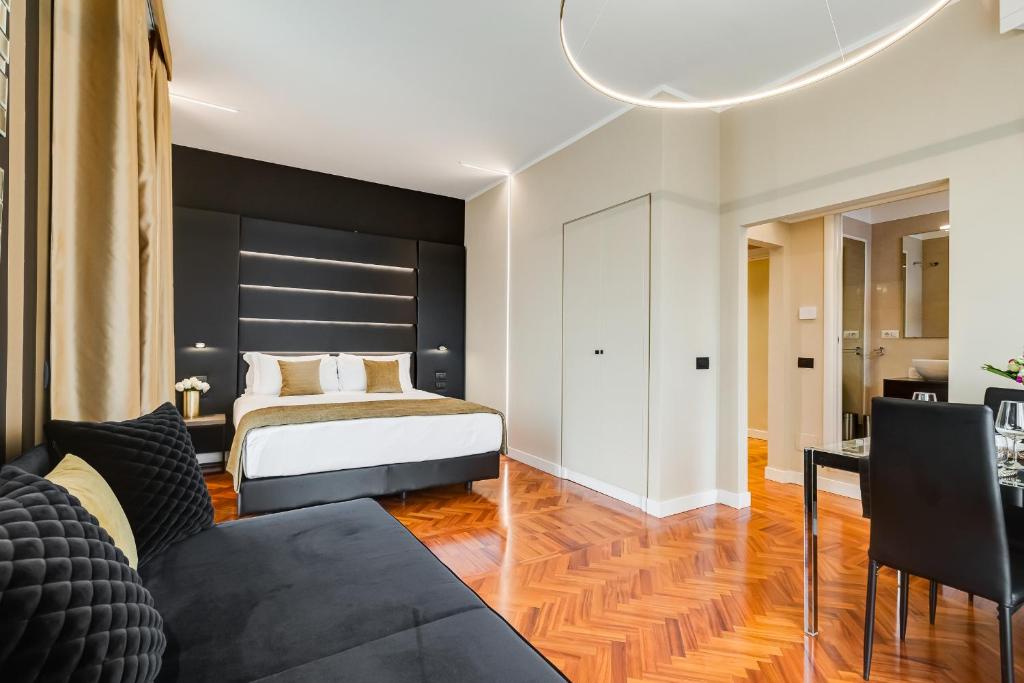 Łóżko lub łóżka w pokoju w obiekcie Frattina High-end apt