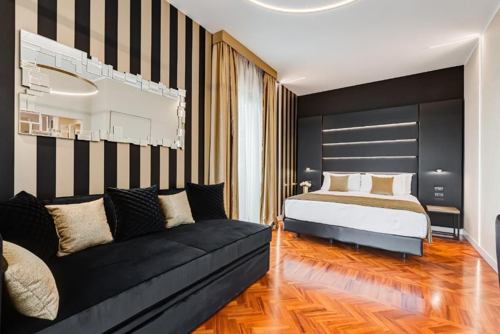 Łóżko lub łóżka w pokoju w obiekcie Frattina High-end apt
