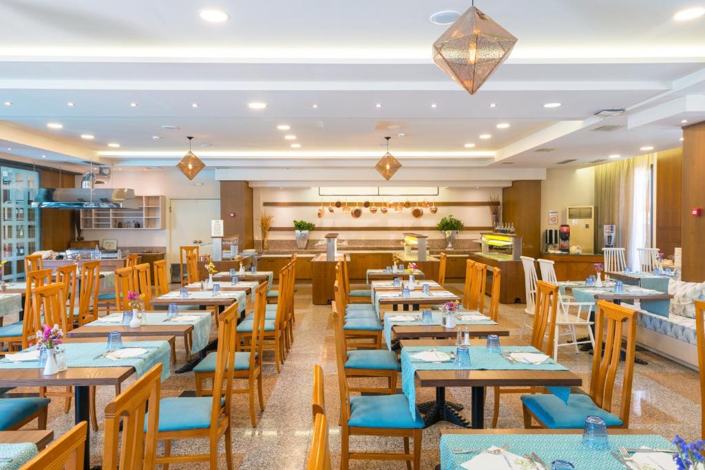 A restaurant or other place to eat at Mediterranean Resort
