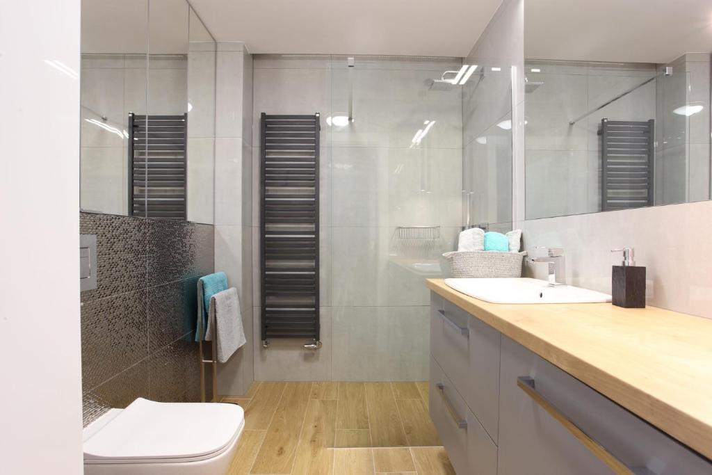 Kúpeľňa v ubytovaní Apartament Gardenia Sea&Sun DZIWNÓW PRZY PLAŻY